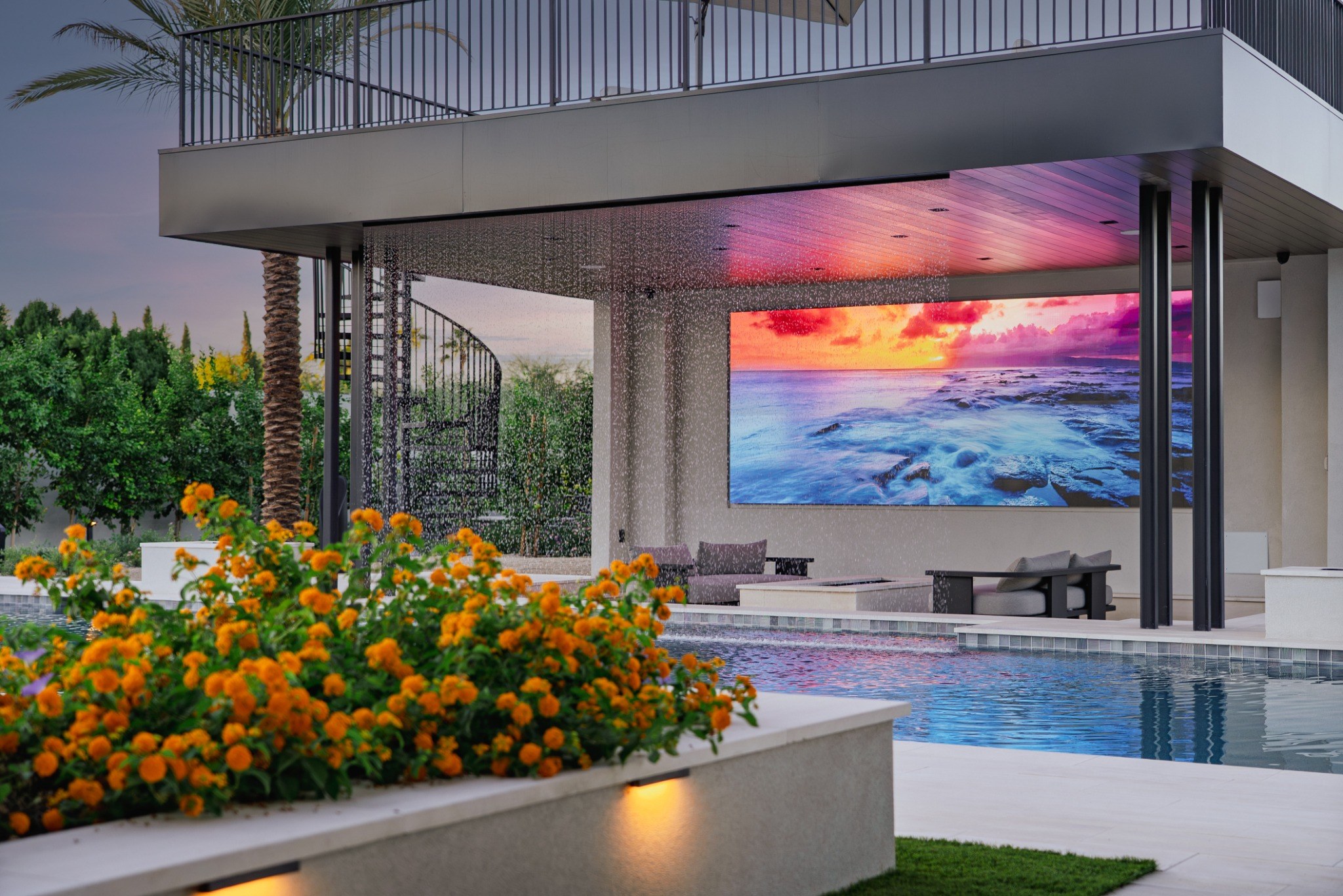 Outdoor entertainment area with colorful ambient lighting